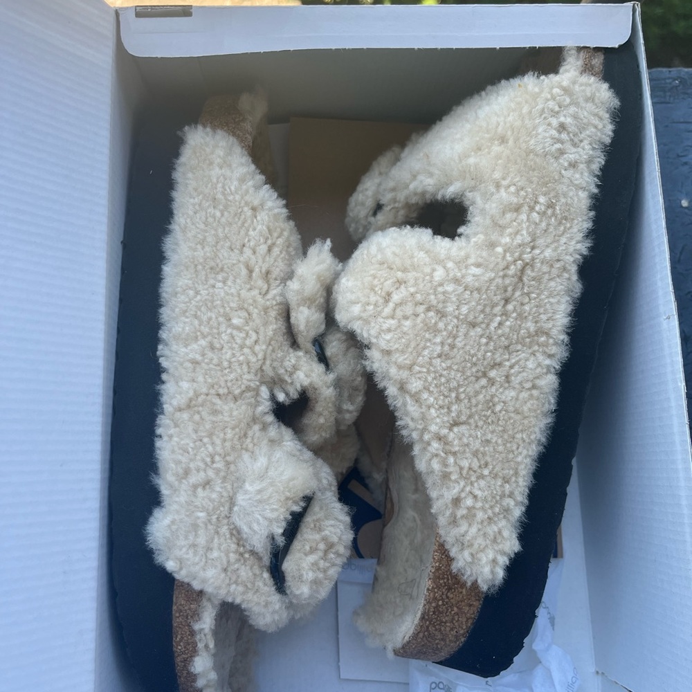 The color is eggshell these shoes are narrow